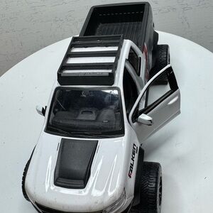 White and Black Toy Truck